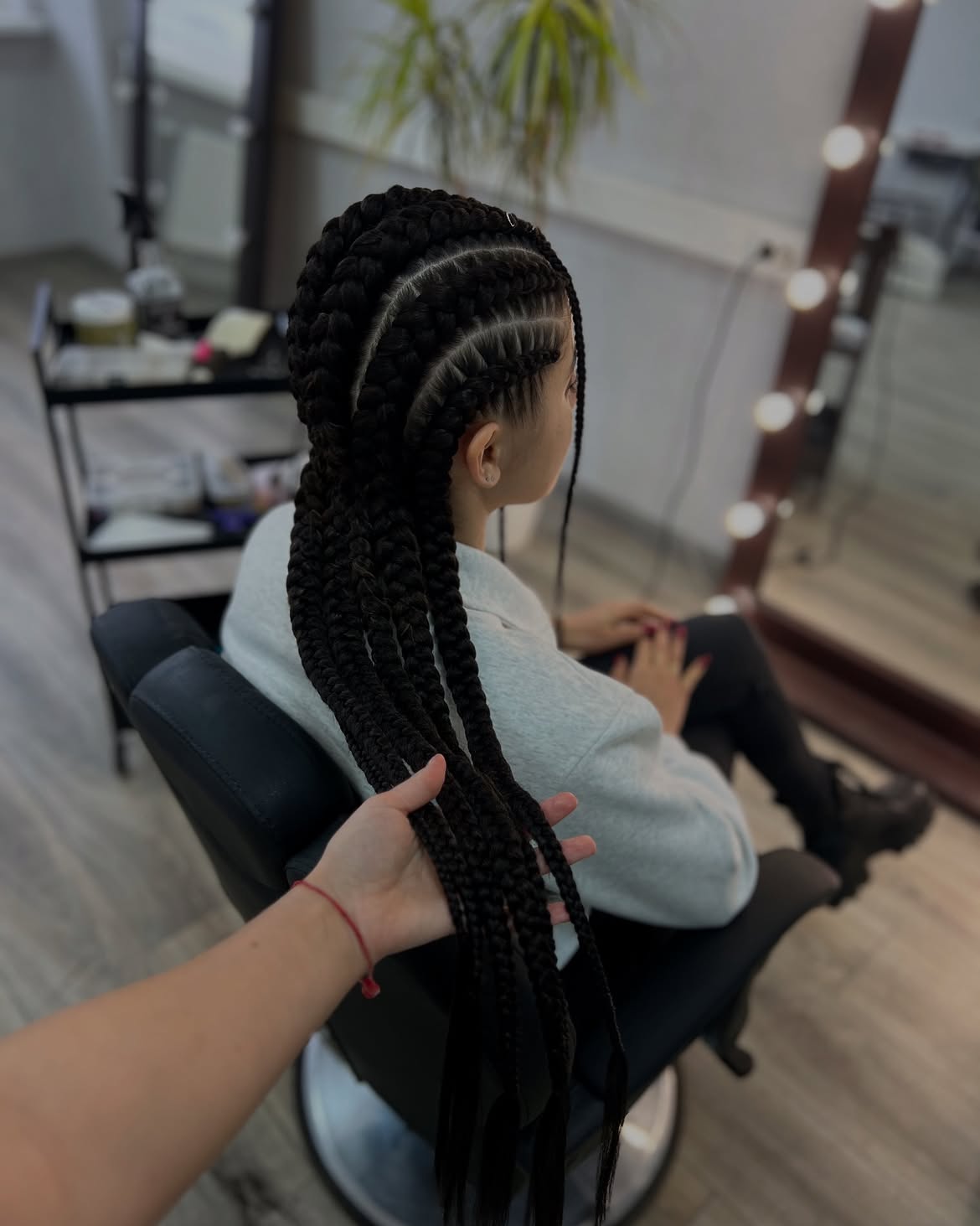 Sleek Cornrow Feed-In Braids With Extended Length