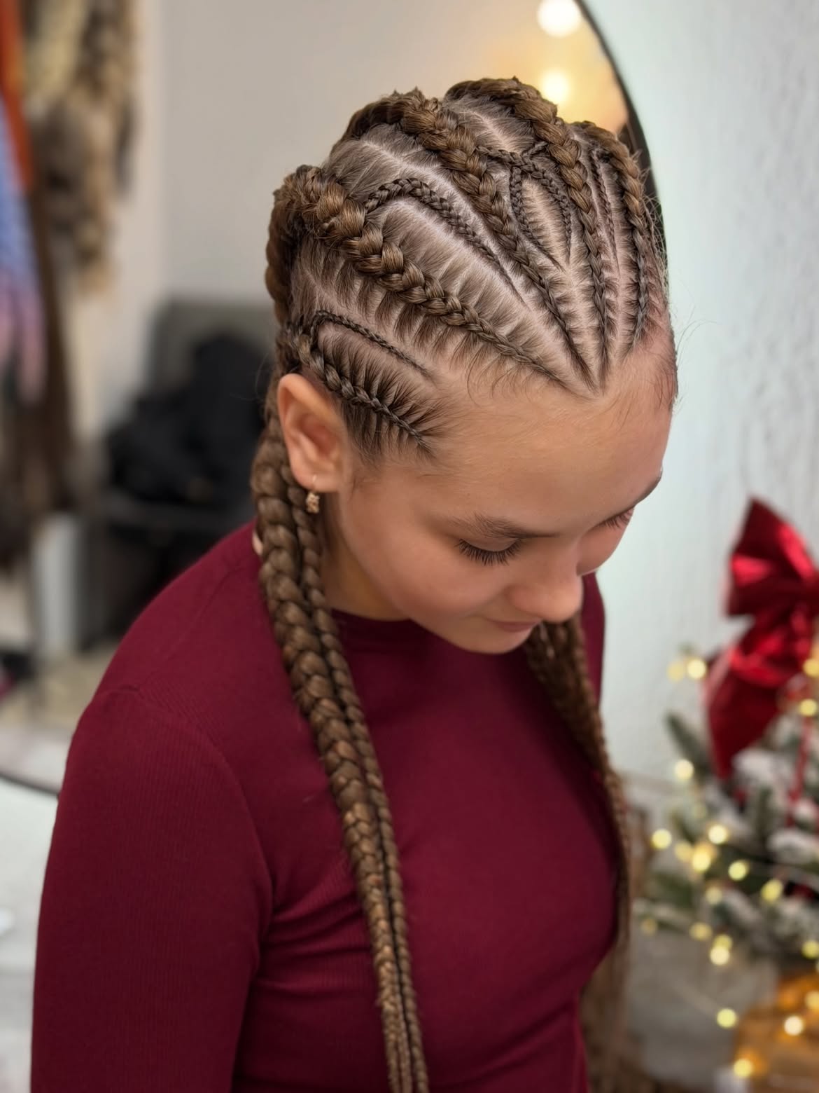 Sleek Crown Braids With Flowing Ends