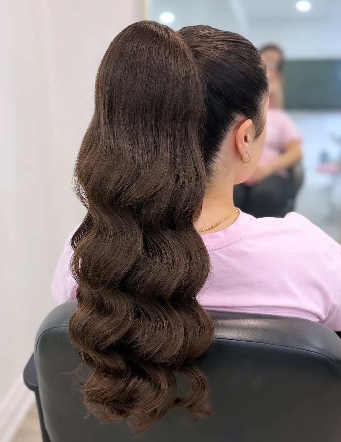 Sleek High Ponytail With Defined Mermaid Waves