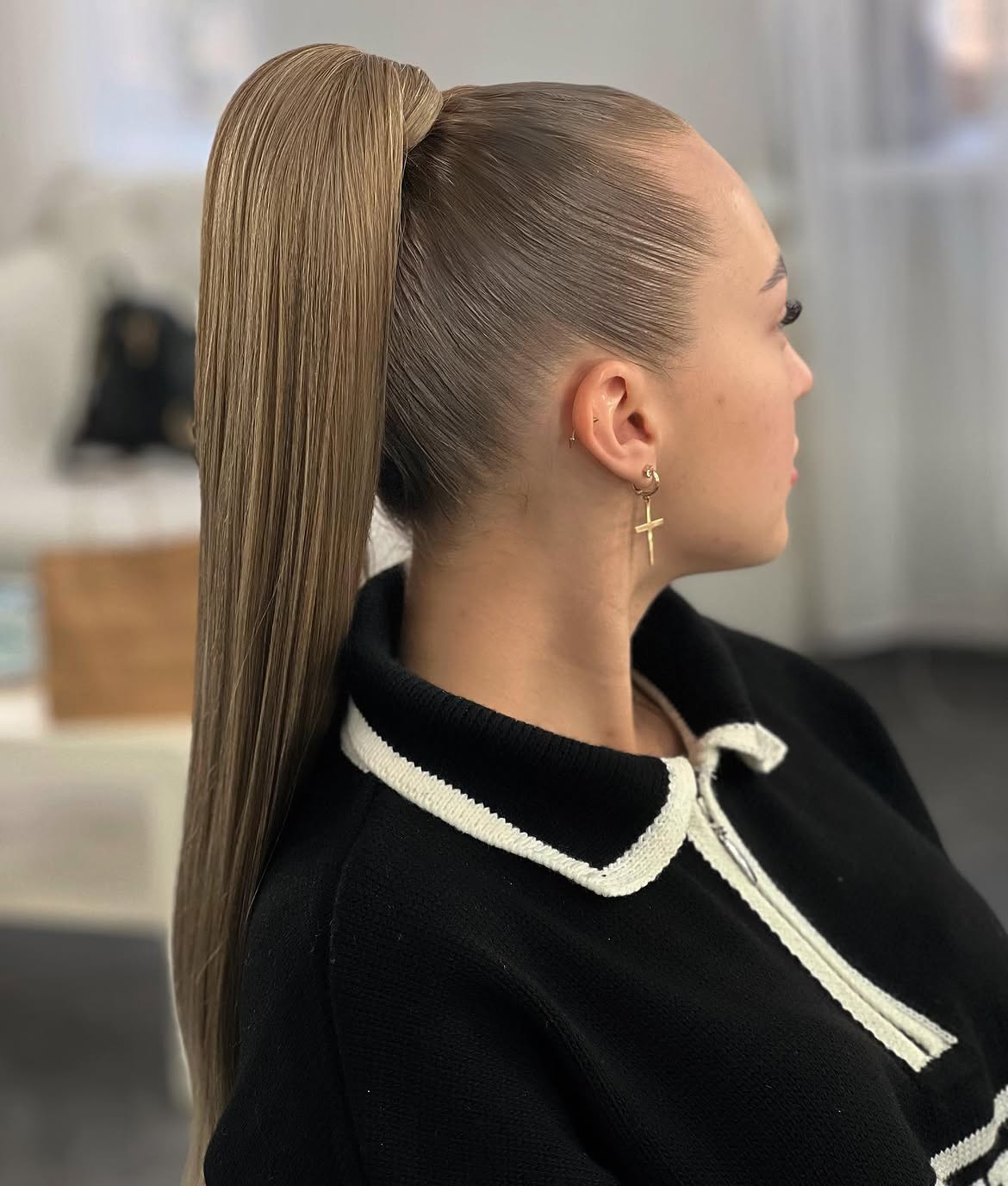 Sleek High Ponytail With Dimensional Ash Blonde Tones