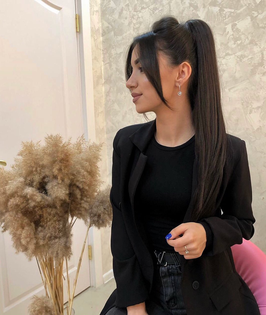 Sleek High Ponytail With Face Framing Strands