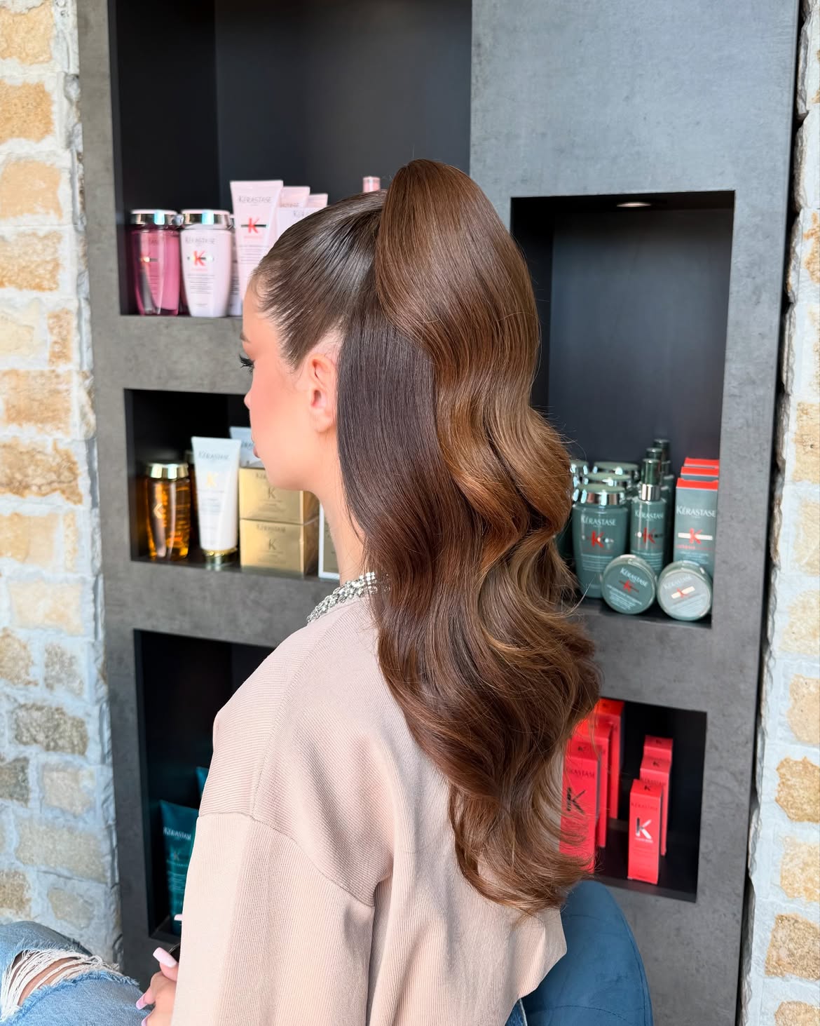 Sleek High Ponytail With Hollywood Waves