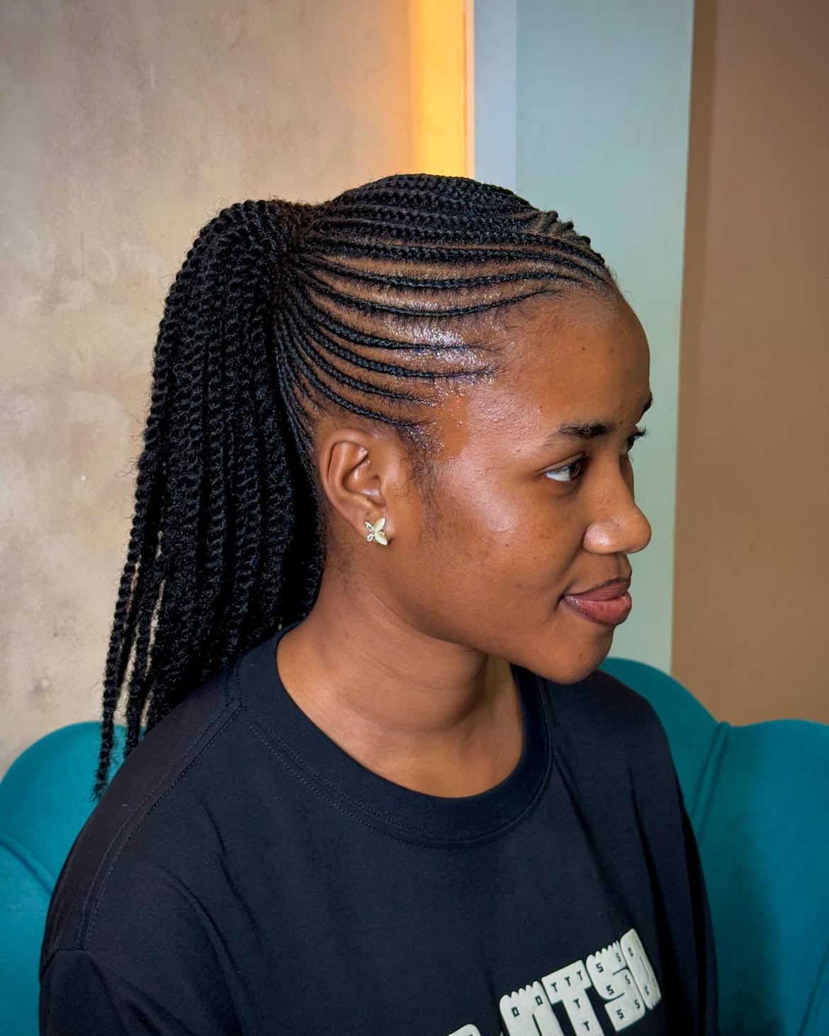 Sleek High Ponytail With Medium Knotless Braids