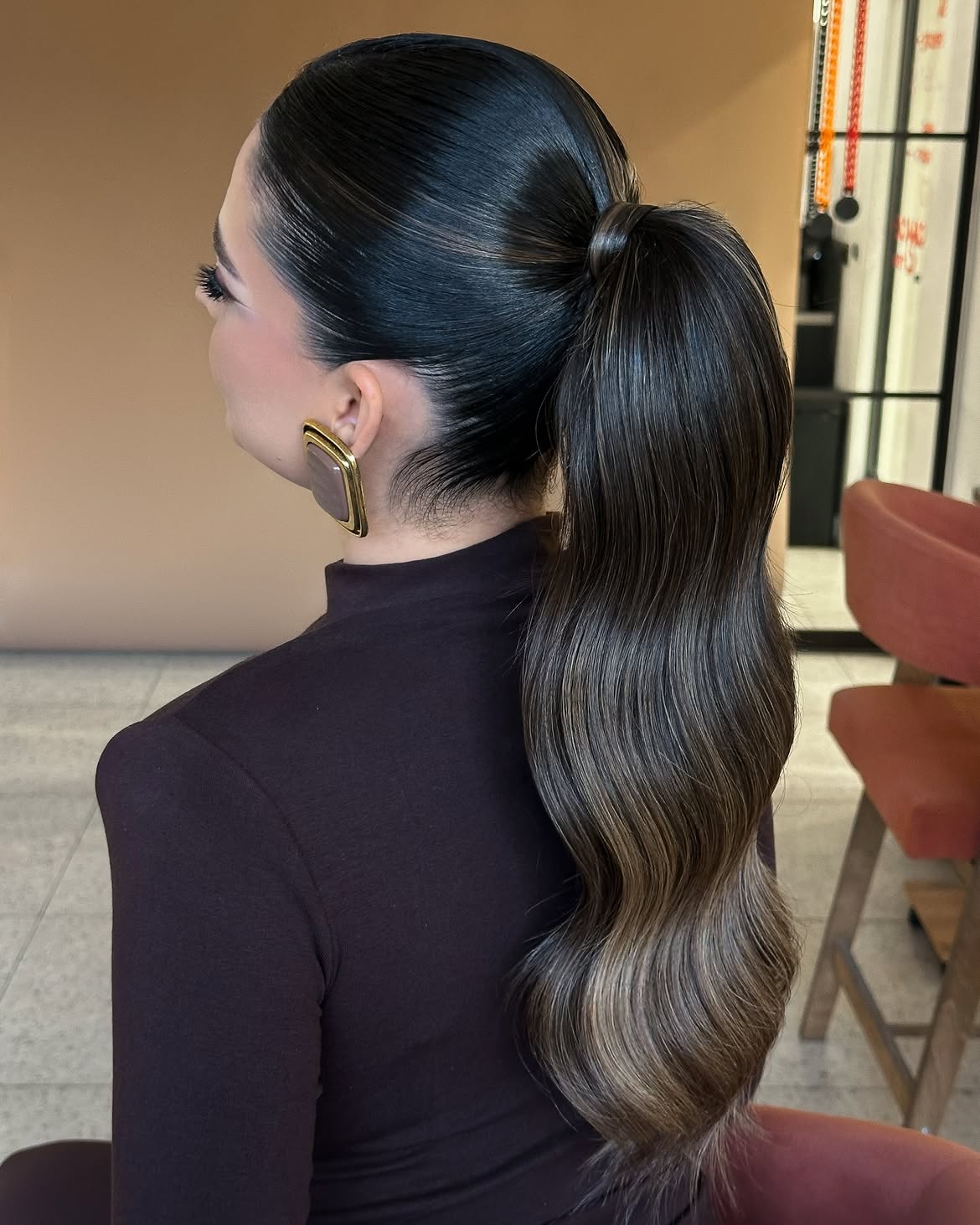 Sleek High Ponytail With Polished Waves