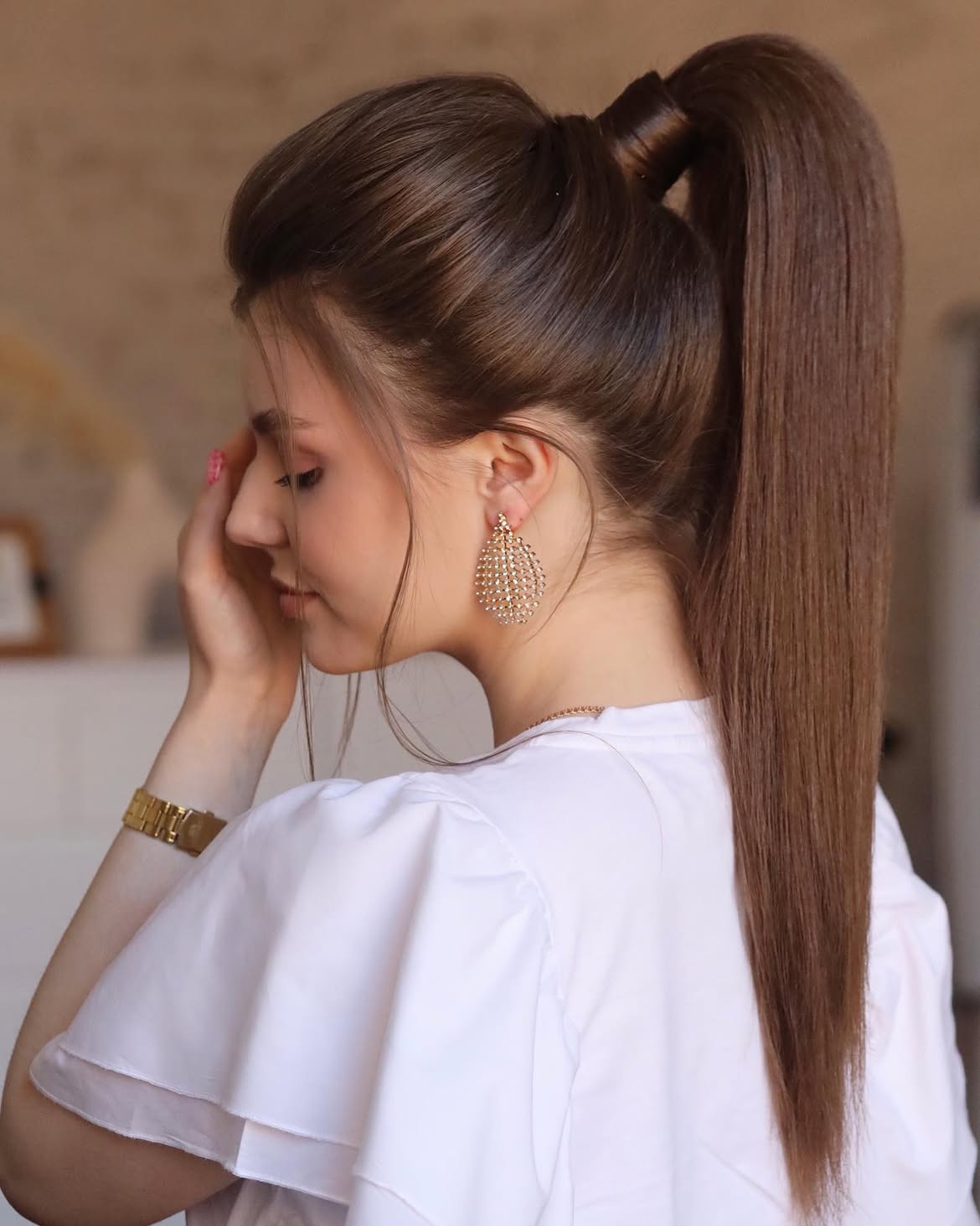Sleek High Ponytail With Wrapped Base