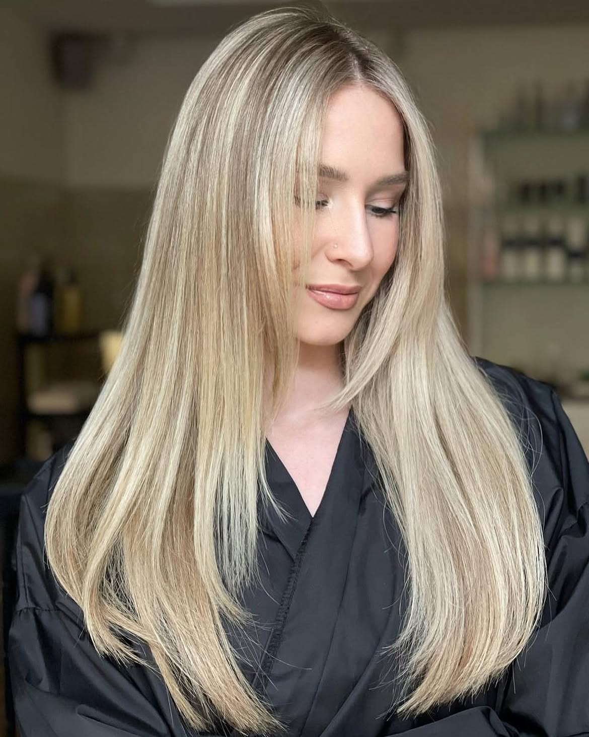 Sleek Lived In Blonde With Face Framing Layers