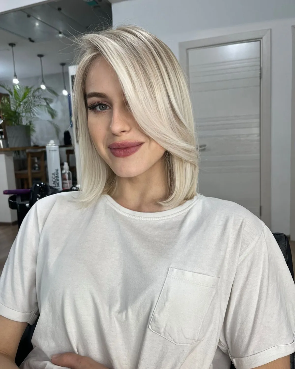 Sleek Platinum Blonde Lob With Side Swept Fringe