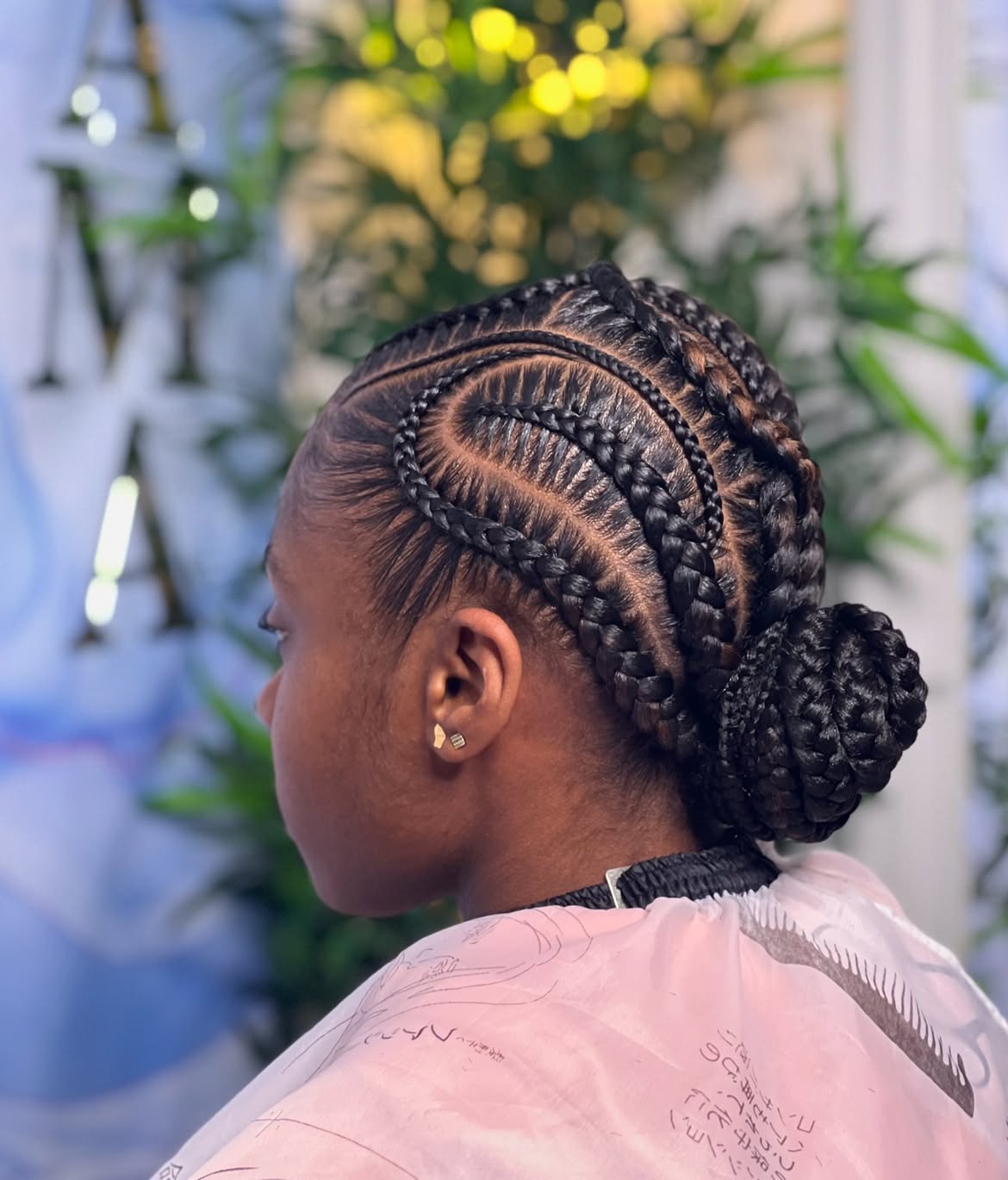Sleek Pop Smoke Braids With Low Bun