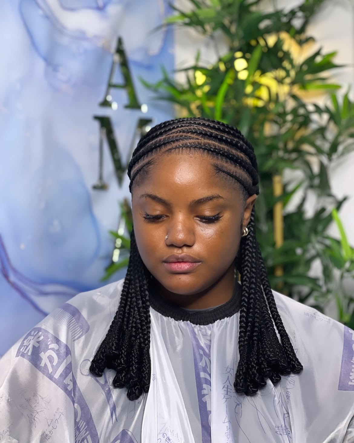 Sleek Pop Smoke Braids With Neat Curved Parts