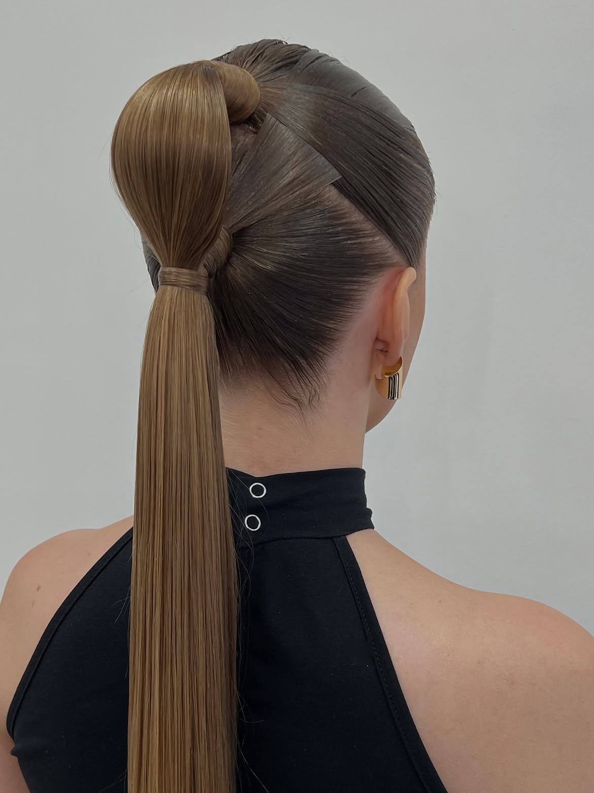 Sleek Sculpted High Ponytail With Wrapped Accent