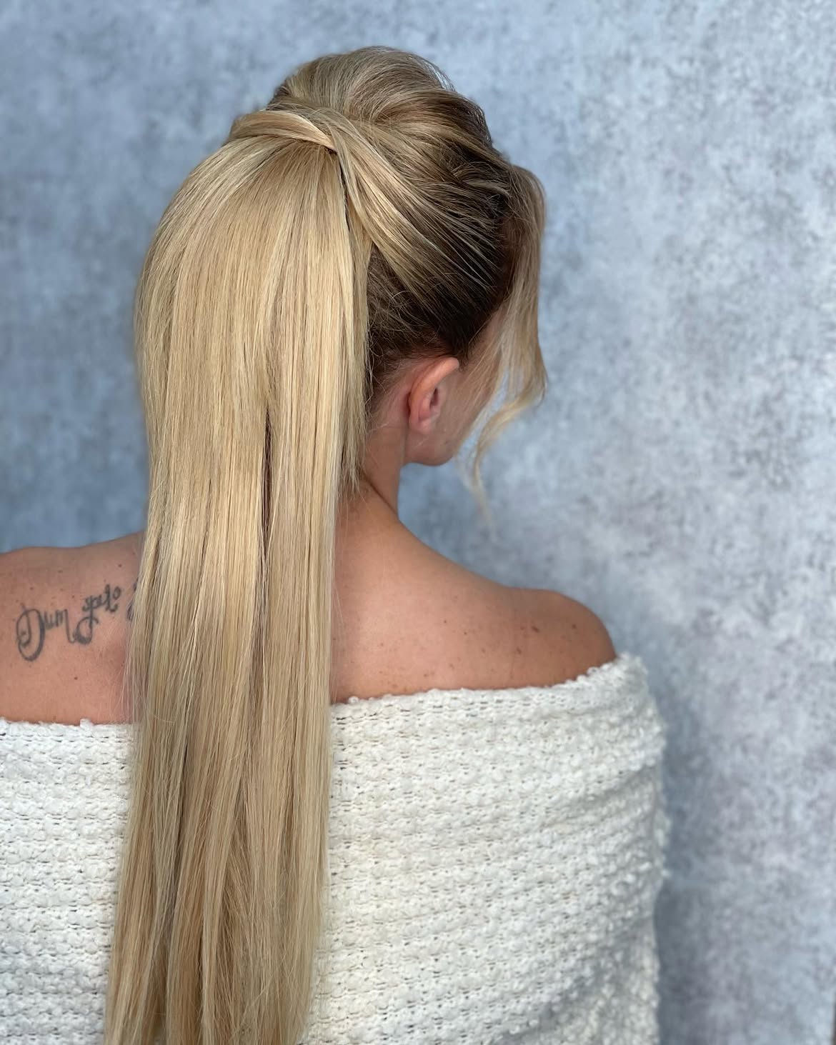 Sleek Wrapped High Ponytail With Face Framing Pieces