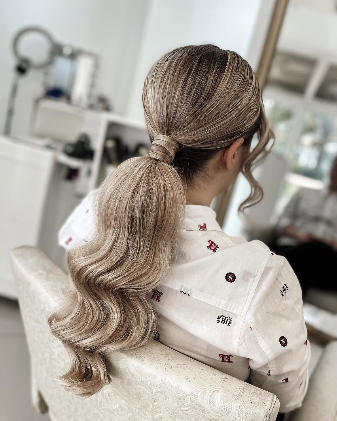 Sleek Wrapped Low Ponytail With Soft Waves