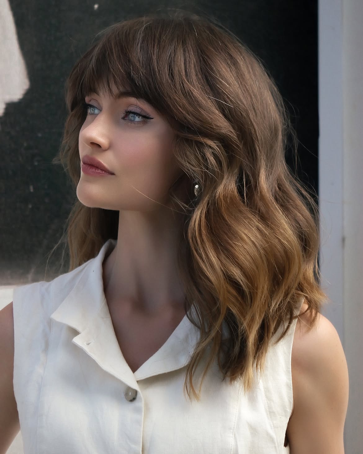 Soft Bronde Waves With Face-Framing Fringe