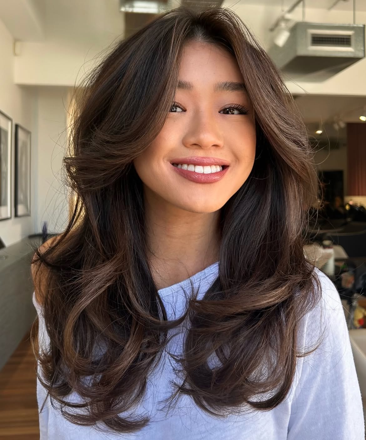 Soft Layered Brown Hair With Wispy Bangs