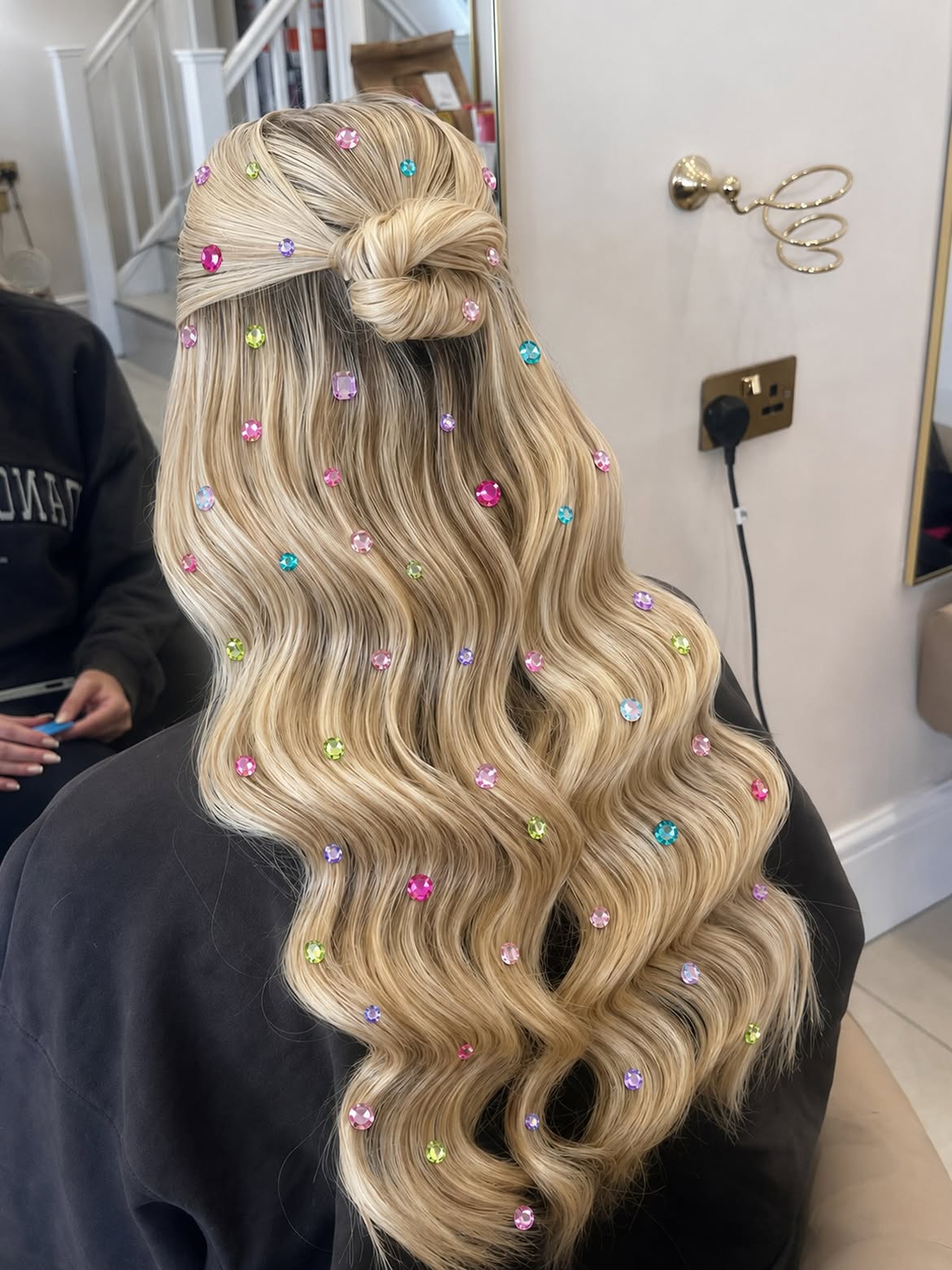 Sparkling Blonde Waves With Top Knot Accent