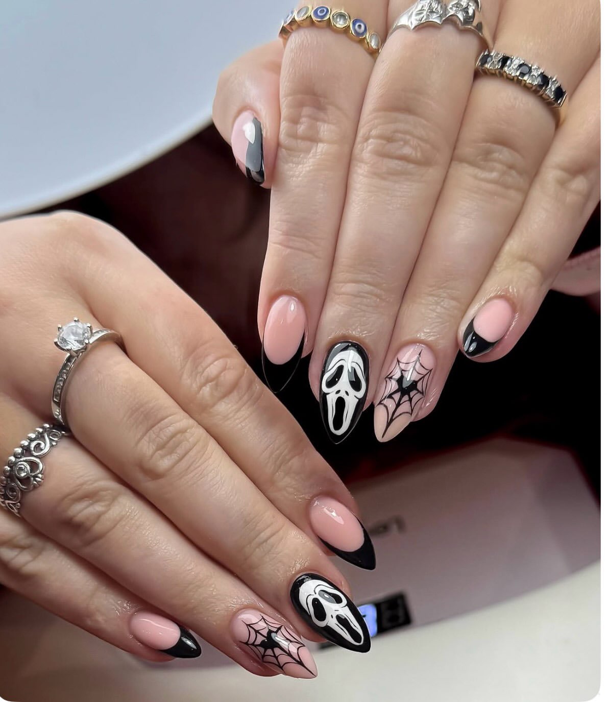Spooky Ghost Face French Tip Almond Nails
