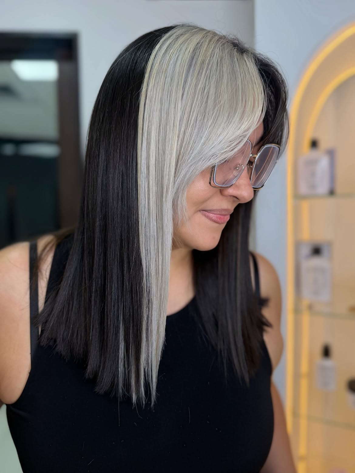 Striking Black and White Skunk Stripe Hair