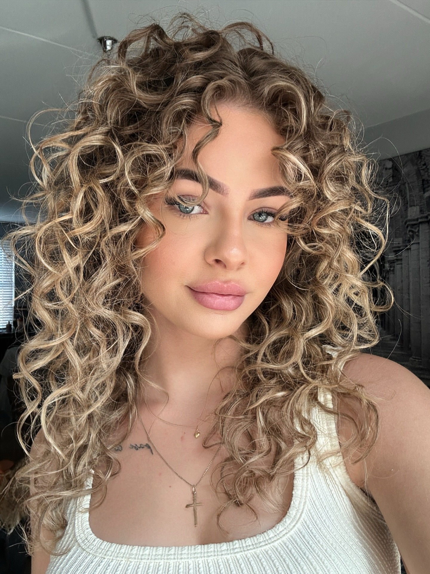 Sun-Kissed Honey Blonde Loose Curls With Face Framing