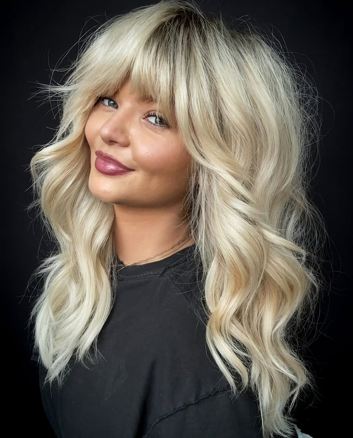 Textured Bronde Waves With Face-Framing Bangs