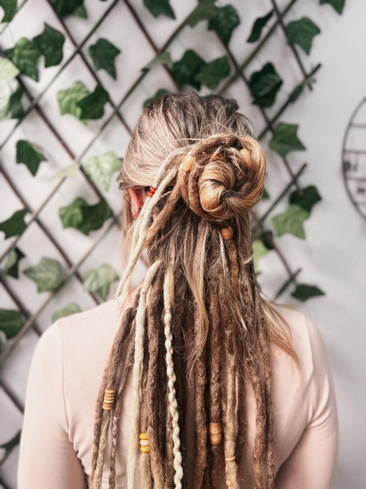 Textured Dreadlock Updo With Braided Accents