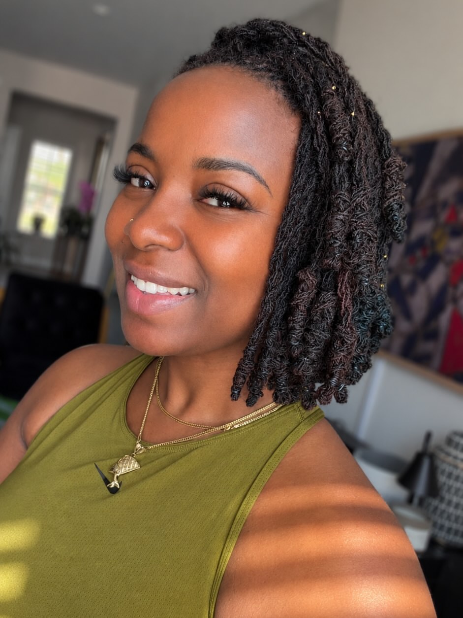 Textured Locs With Subtle Teal & Gold Accents