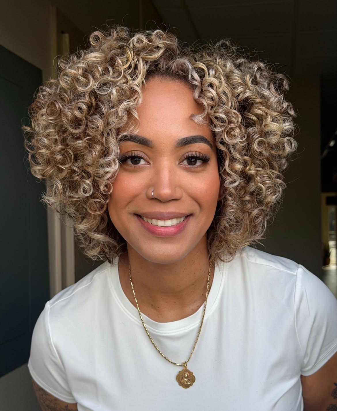 Tousled Honey Blonde Curls With Face Framing