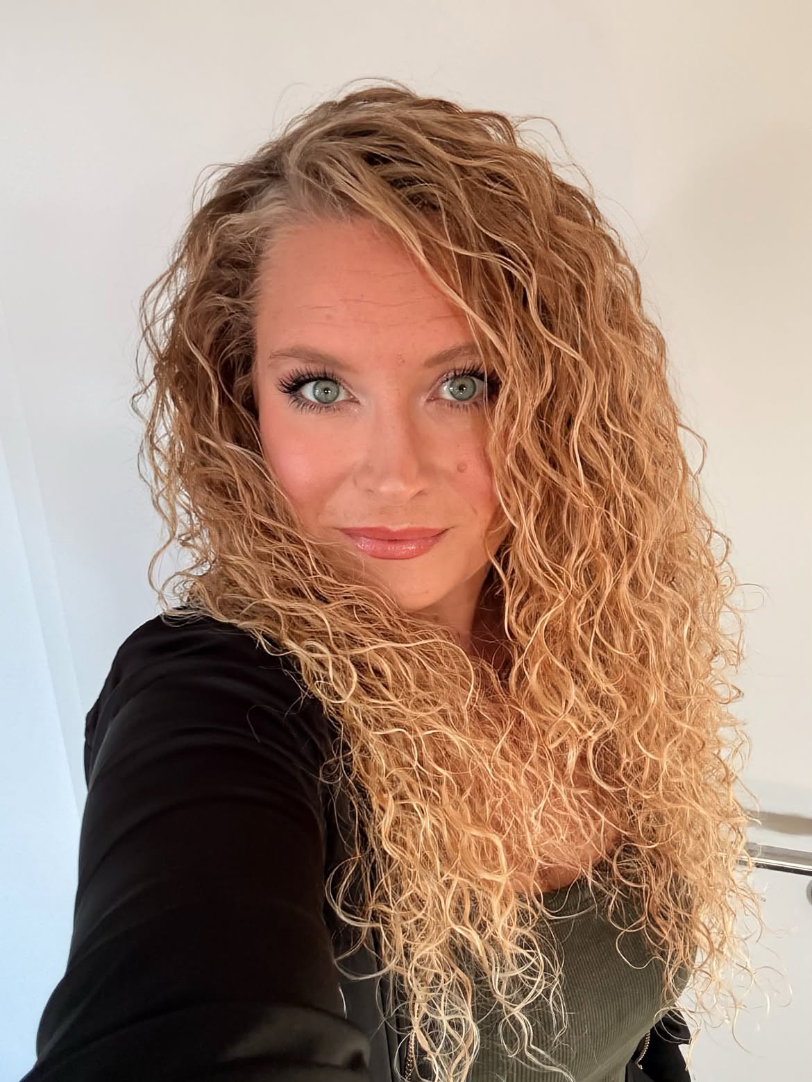 Tousled Honey Blonde Curls With Face Framing