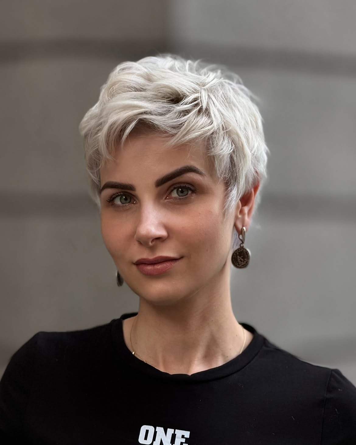 Tousled Platinum Pixie With Textured Layers