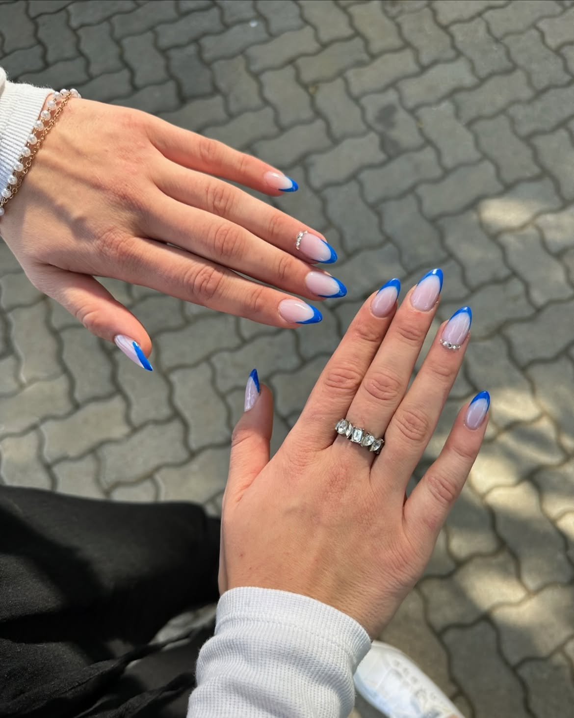 Vibrant Blue French Almond Tips with Gems