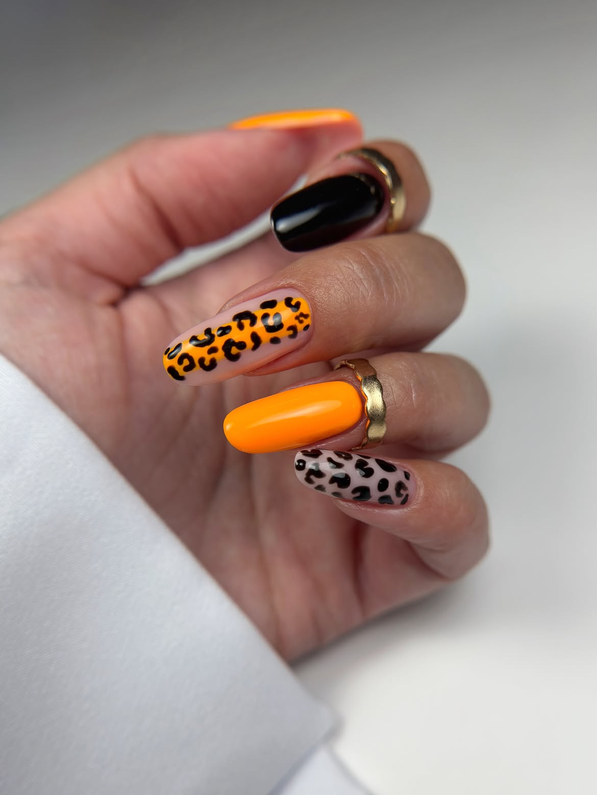Vibrant Orange Leopard Print Mix-and-Match Nails