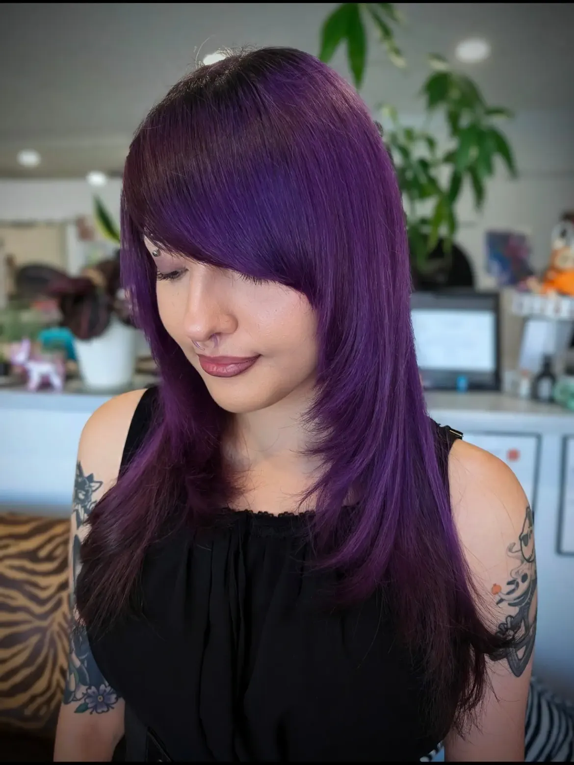 Vibrant Purple Layered Cut With Side Swept Bangs
