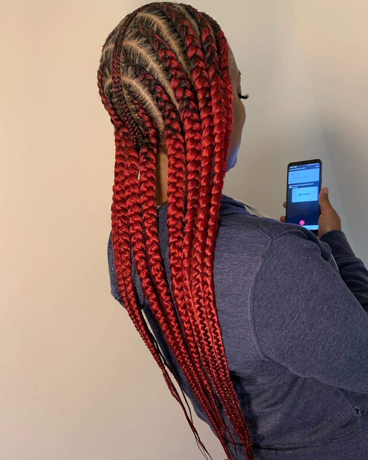 Vibrant Red Pop Smoke Braids With Dark Roots