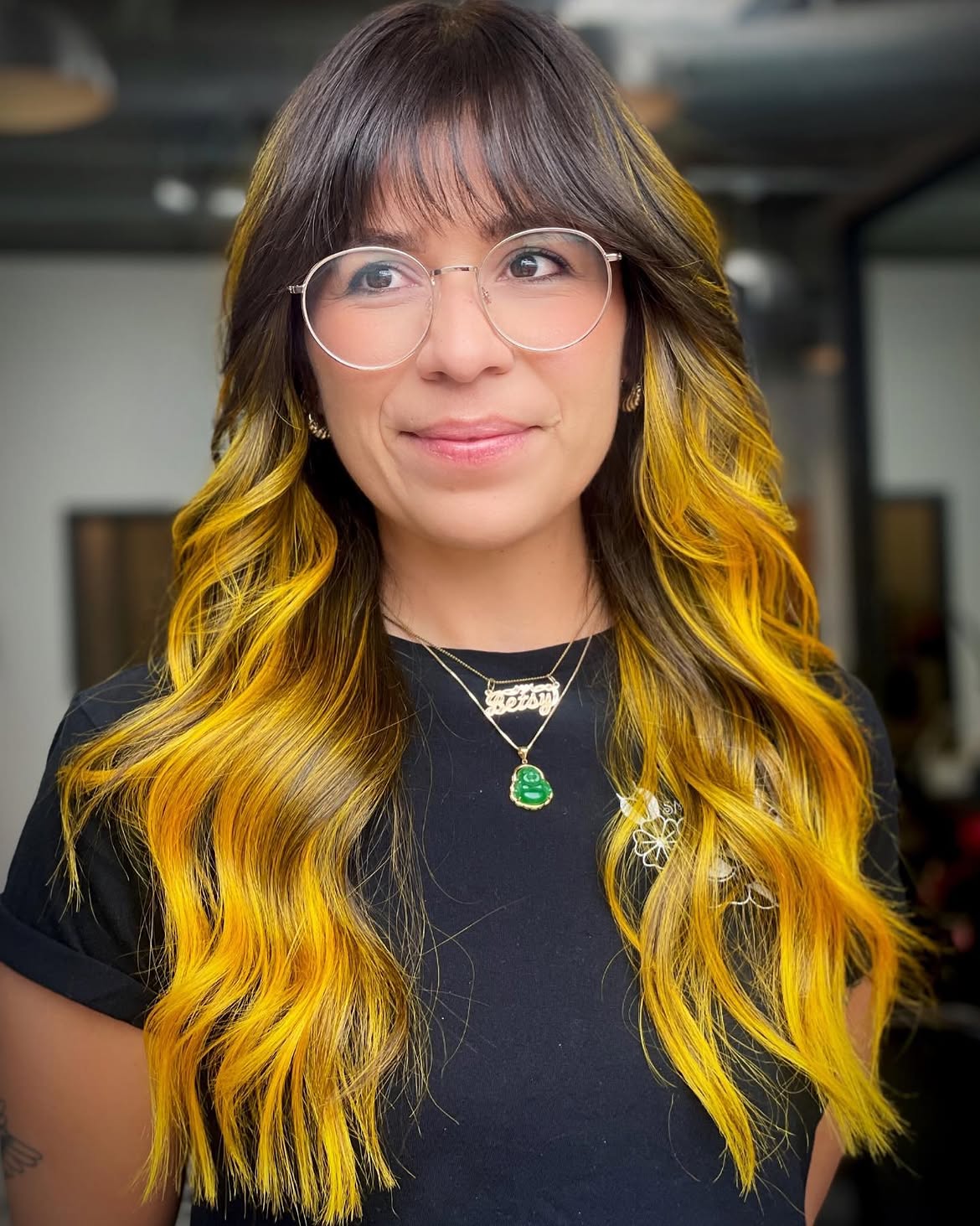 Vibrant Yellow Peekaboo Highlights With Wispy Bangs