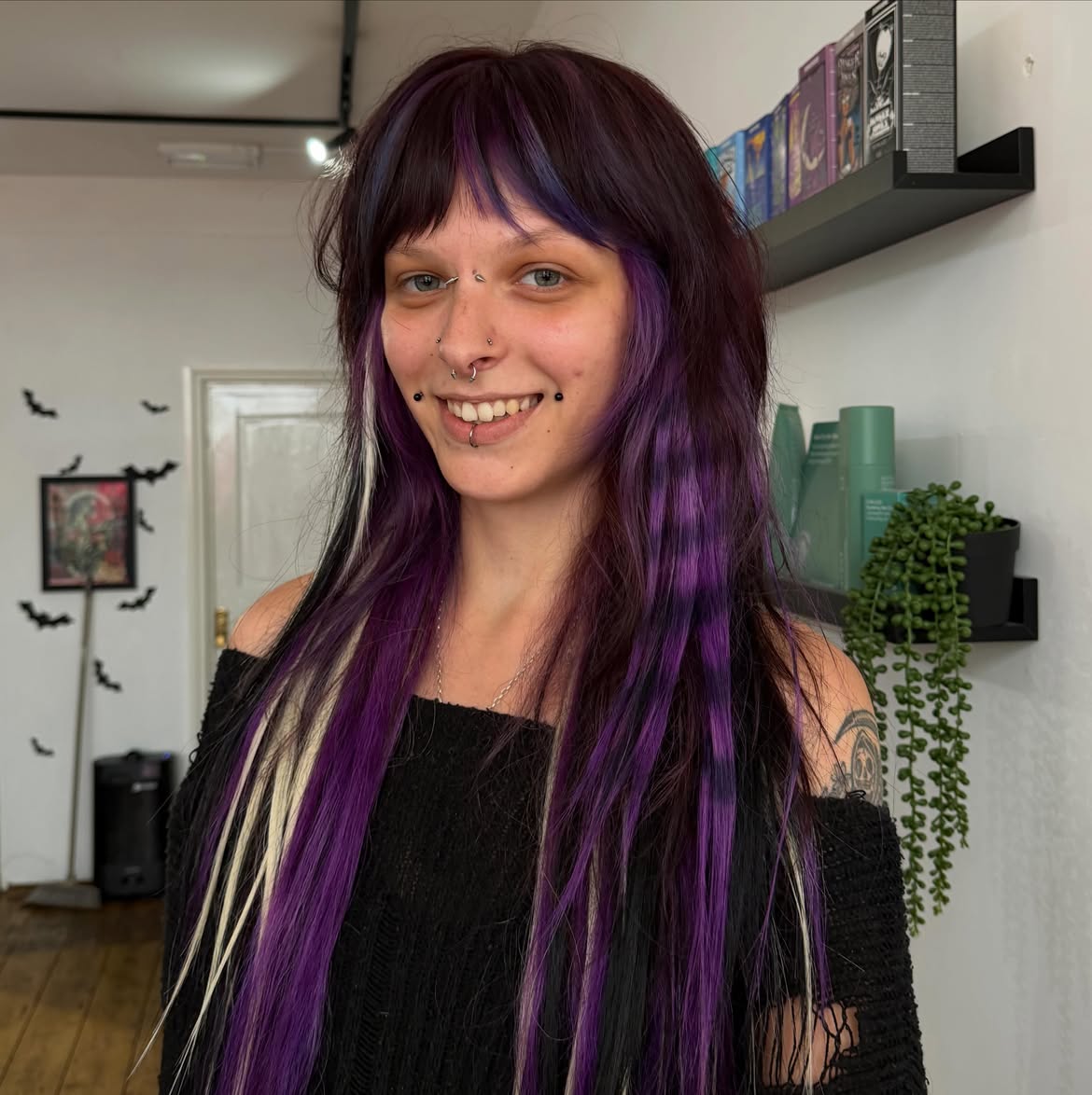 Vivid Purple Streaks With Choppy Bangs