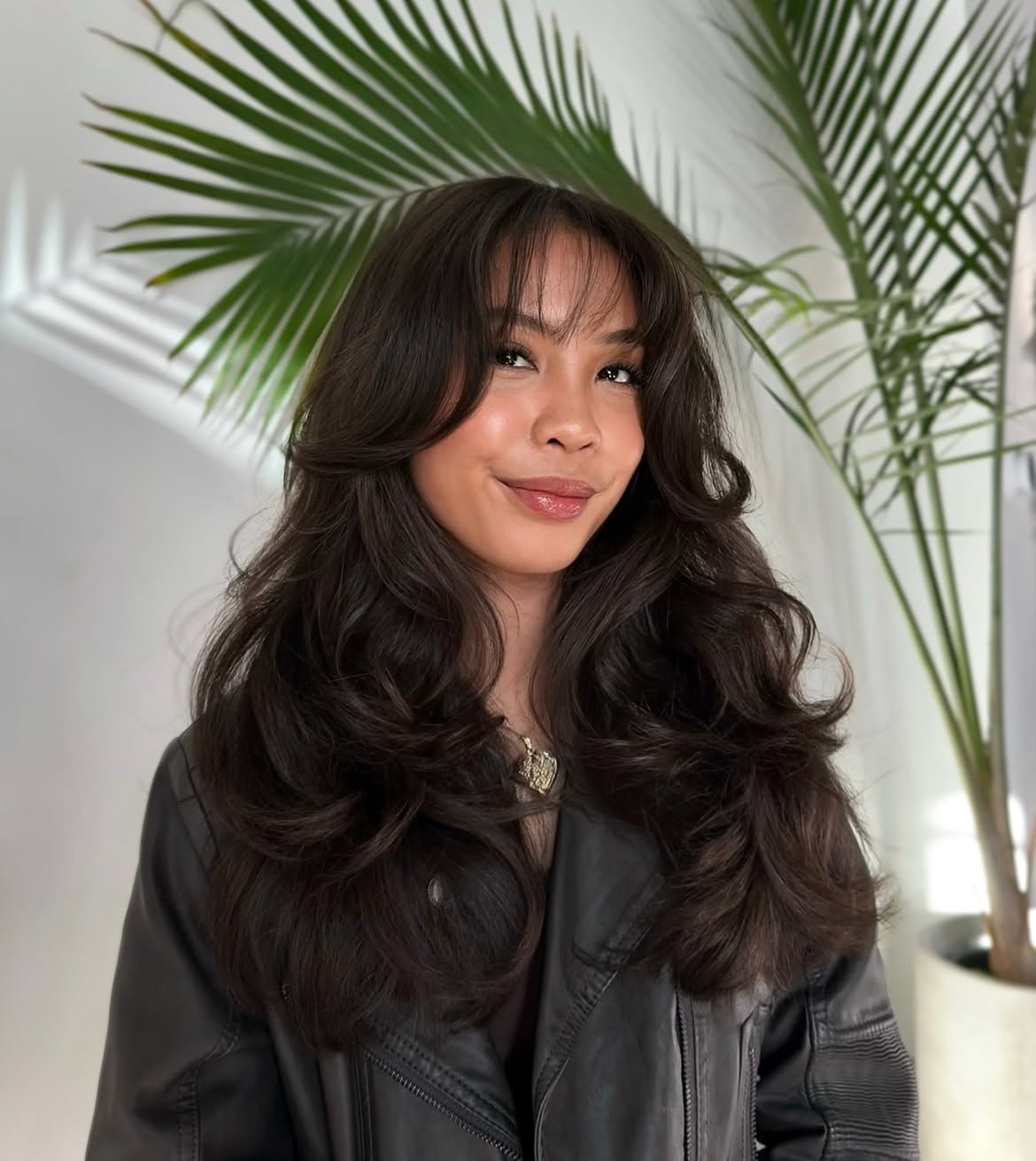 Voluminous Curtain Bangs With Layered Waves