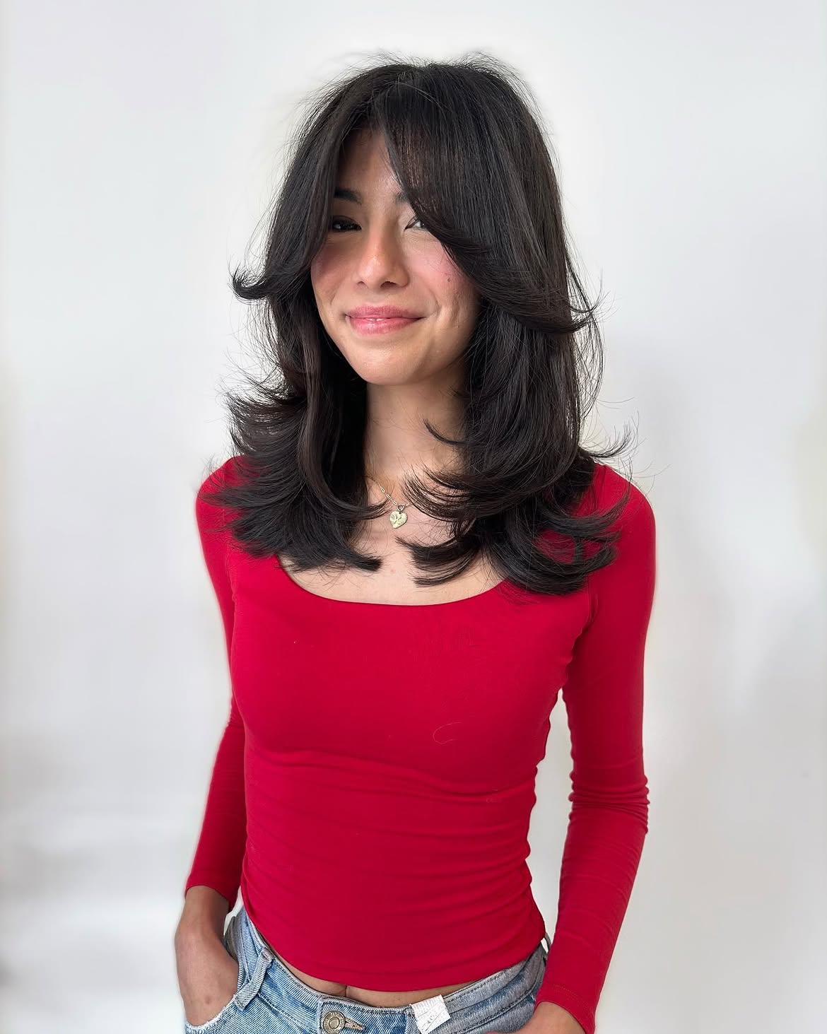 Voluminous Curtain Bangs With Soft Face-Framing Layers