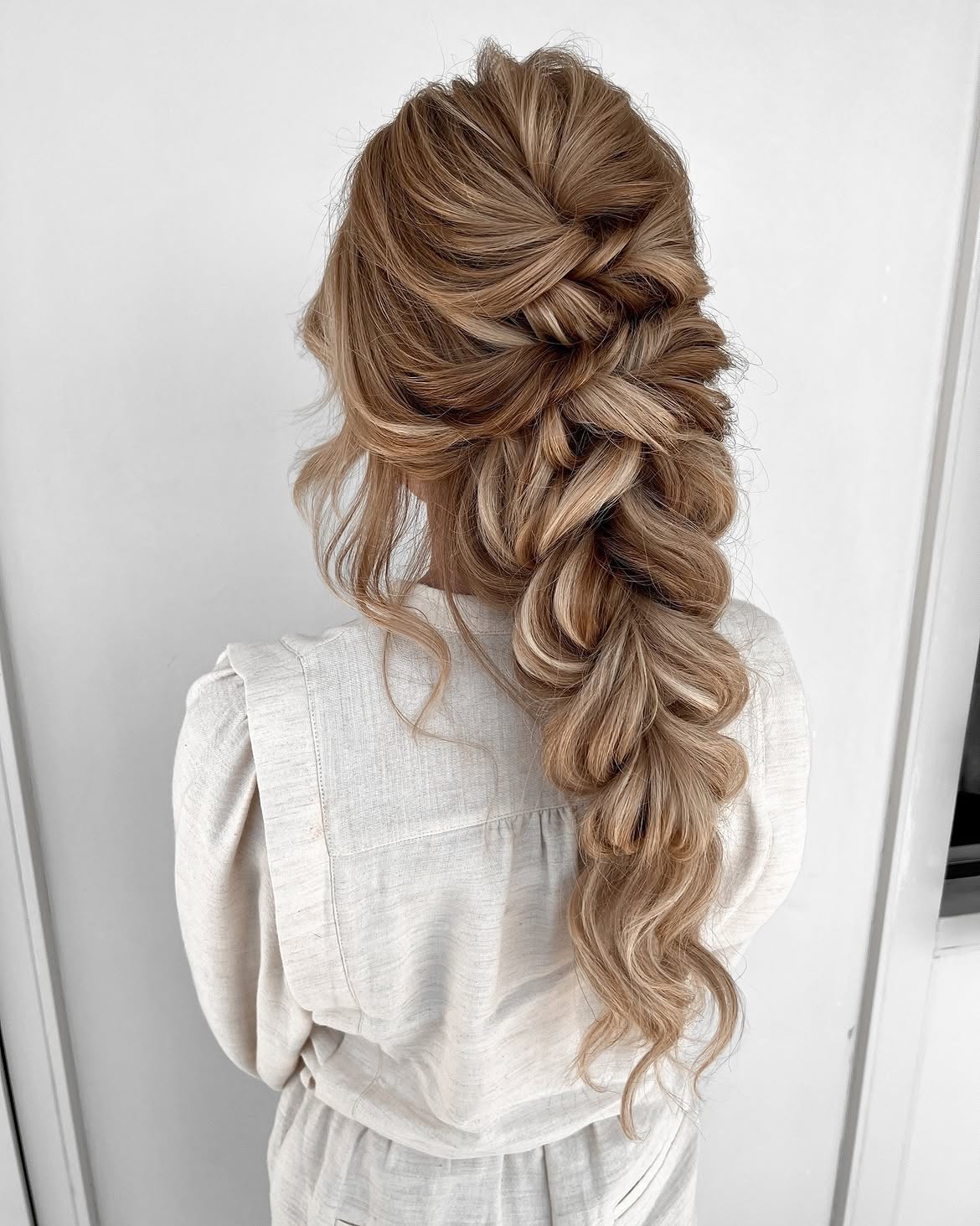 Voluminous French Braid With Loose Waves