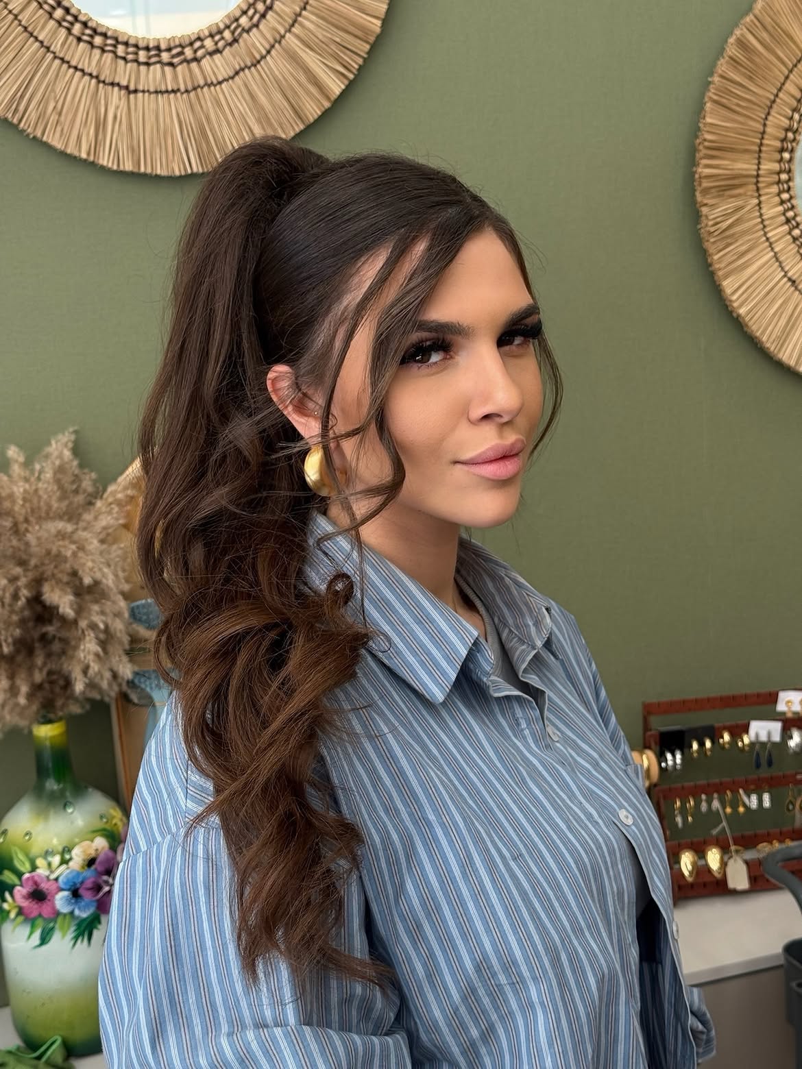 Voluminous High Ponytail With Soft Face Framing Layers