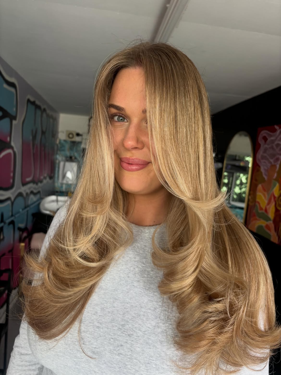 Voluminous Honey Blonde Blowout With Face-Framing Layers