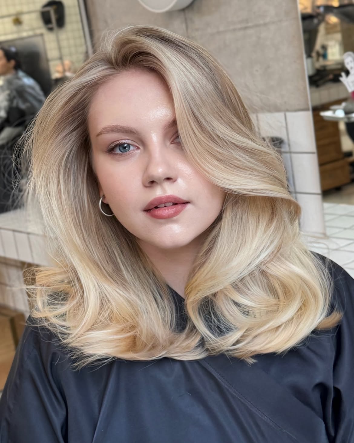 Voluminous Honey Blonde Blowout With Face-Framing Layers