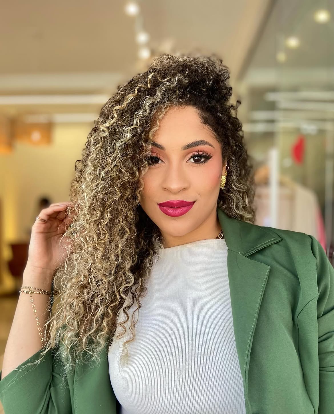 Voluminous Honey Blonde Curls With Lived-In Highlights