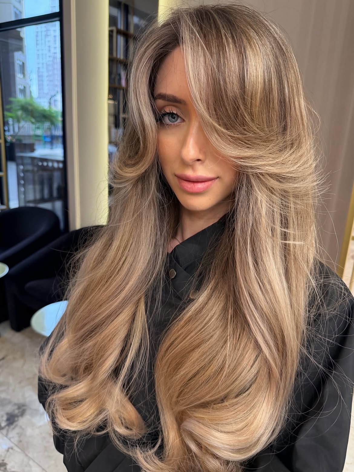 Voluminous Honey Blonde Layered Cut With Face Framing