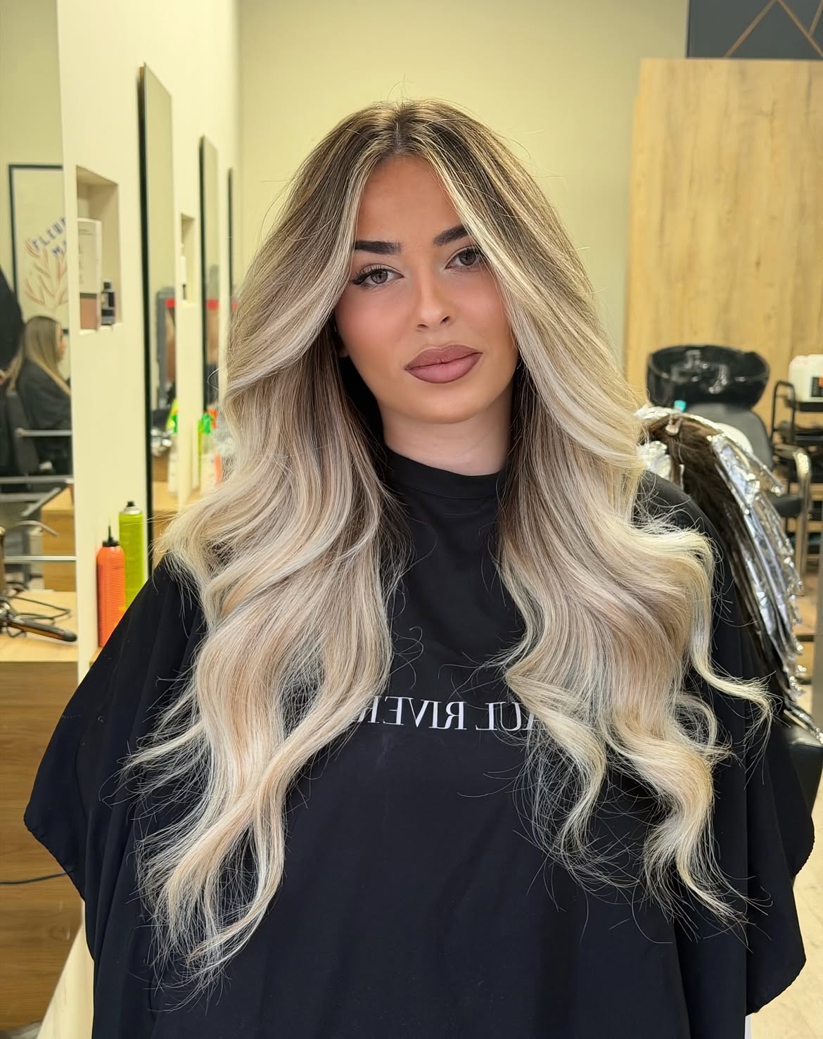 Voluminous Honey Blonde Waves With Face Framing