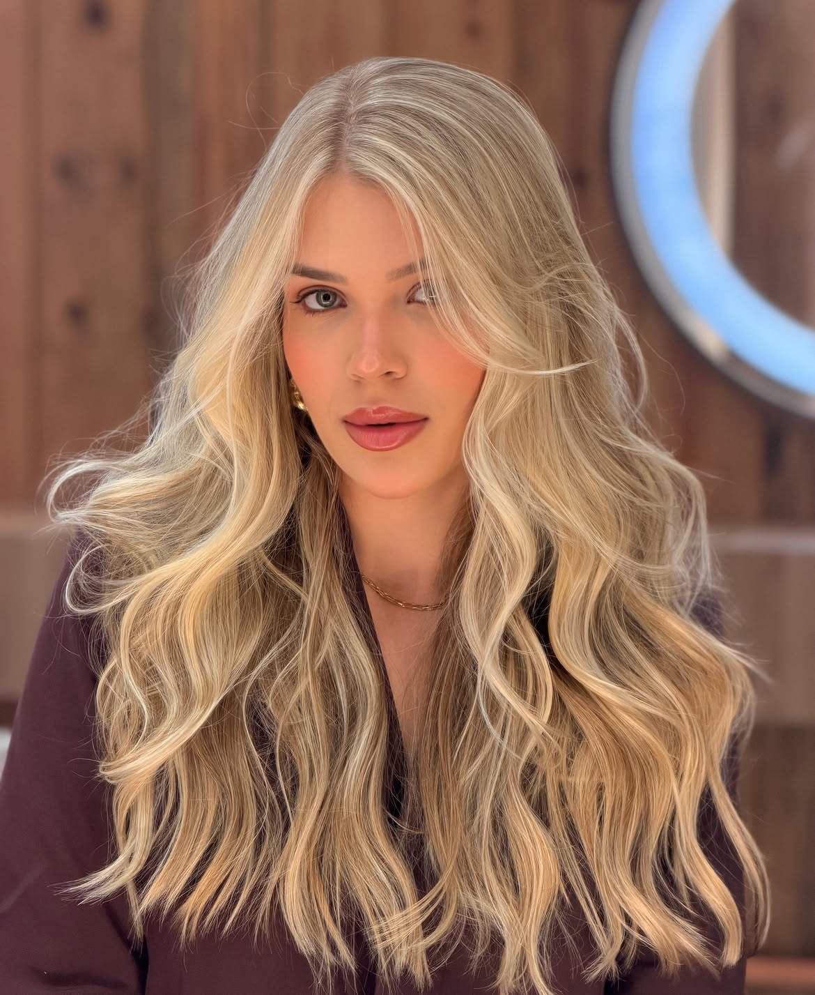 Voluminous Honey Blonde Waves With Face Framing