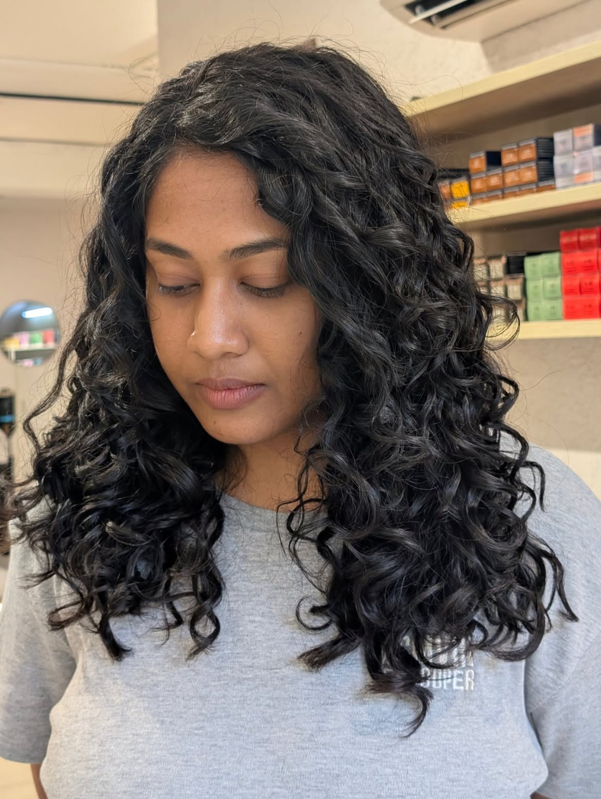 Voluminous Layered Curls For Medium Length Hair