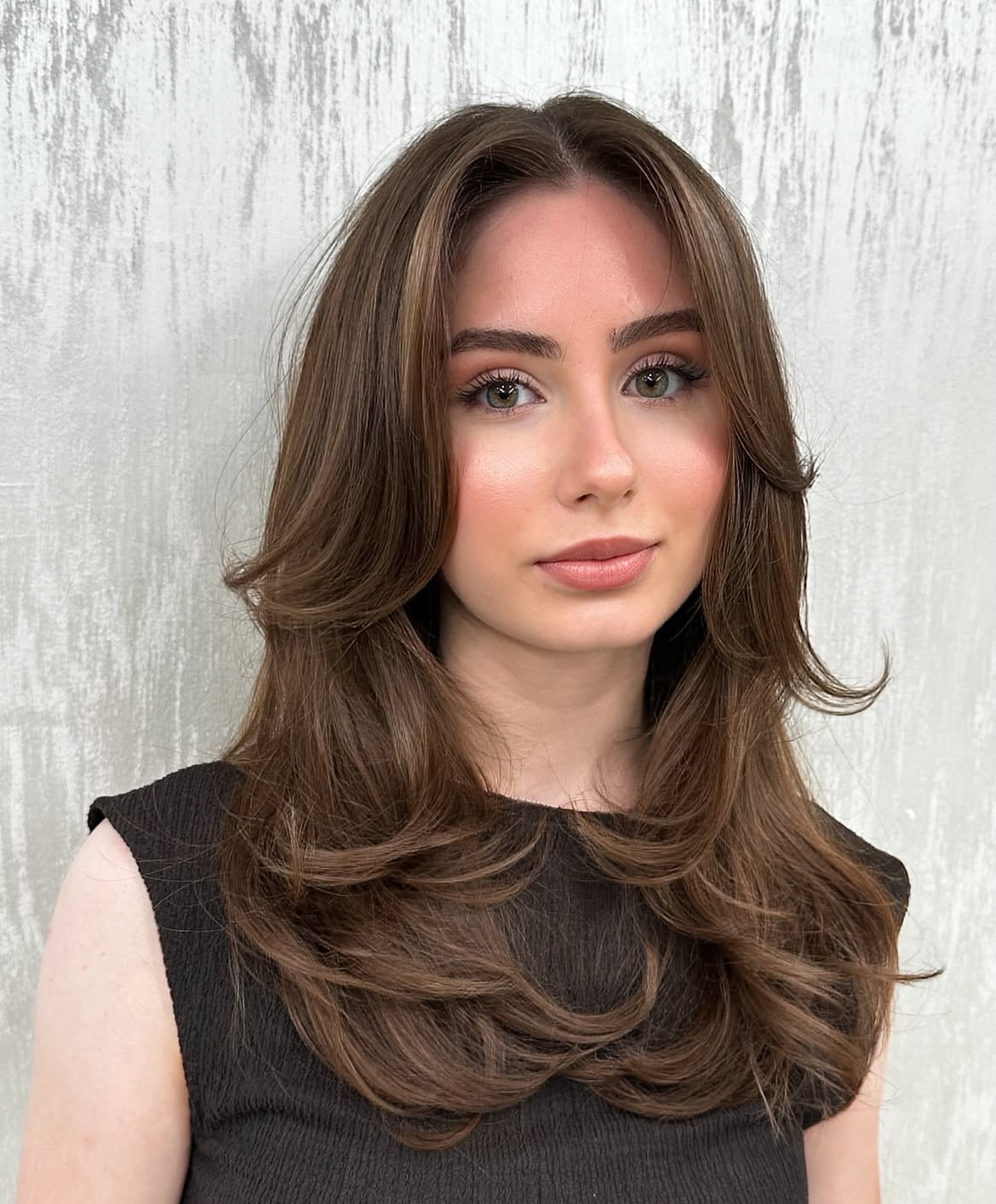 Voluminous Layered Hair With Face-Framing Curtain Bangs