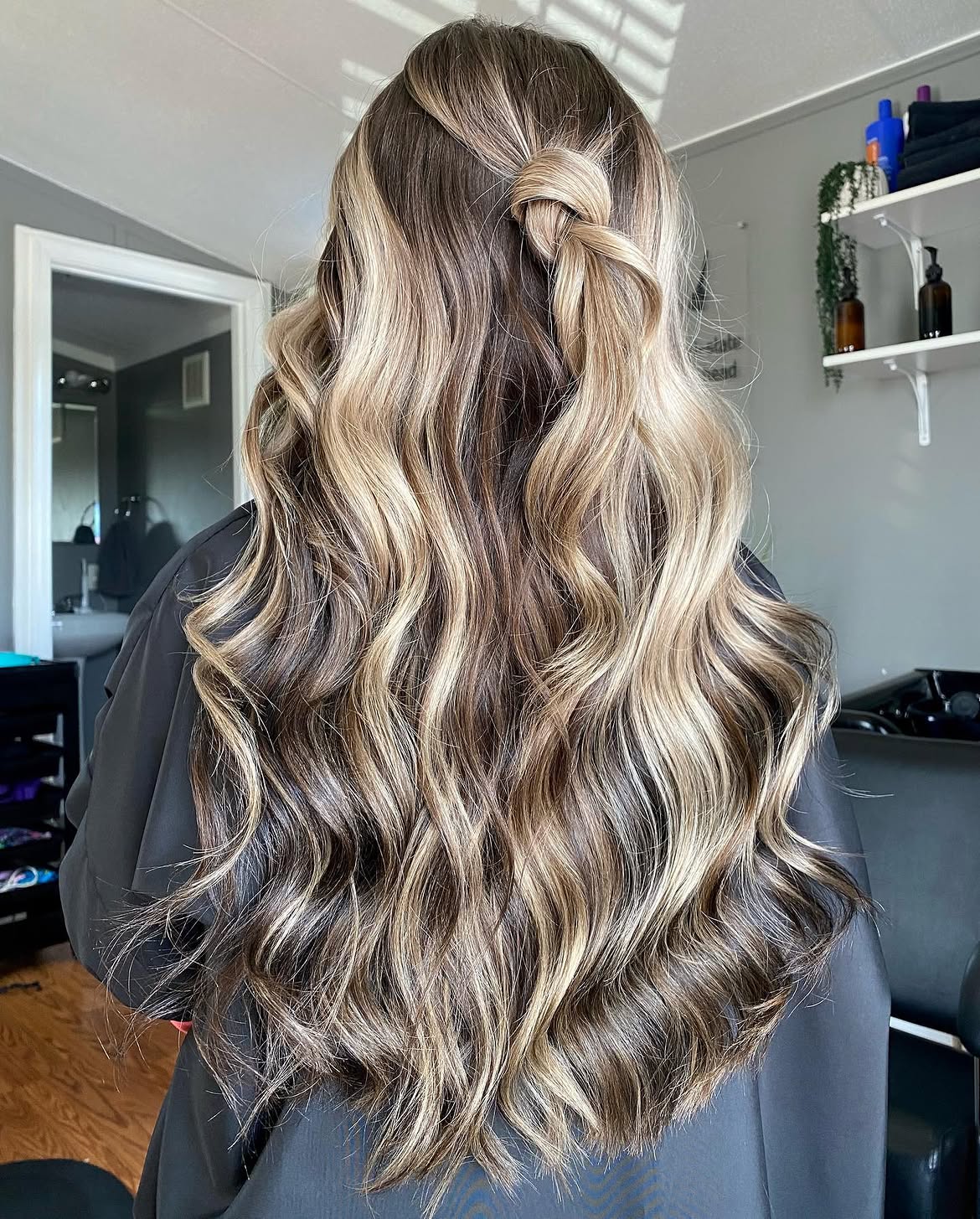 Warm Bronde Waves With A Twisted Accent