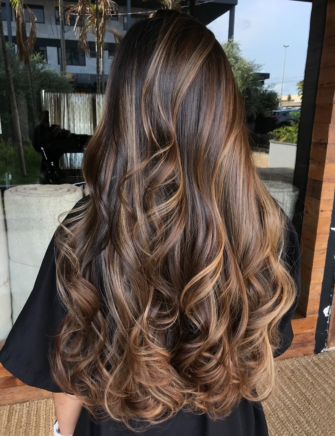 Warm Honey Balayage On Brunette Waves