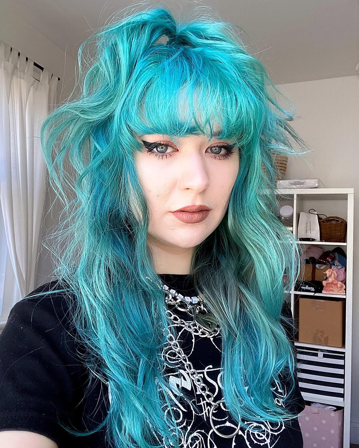 Wavy Teal Mid-Length Cut With Textured Bangs