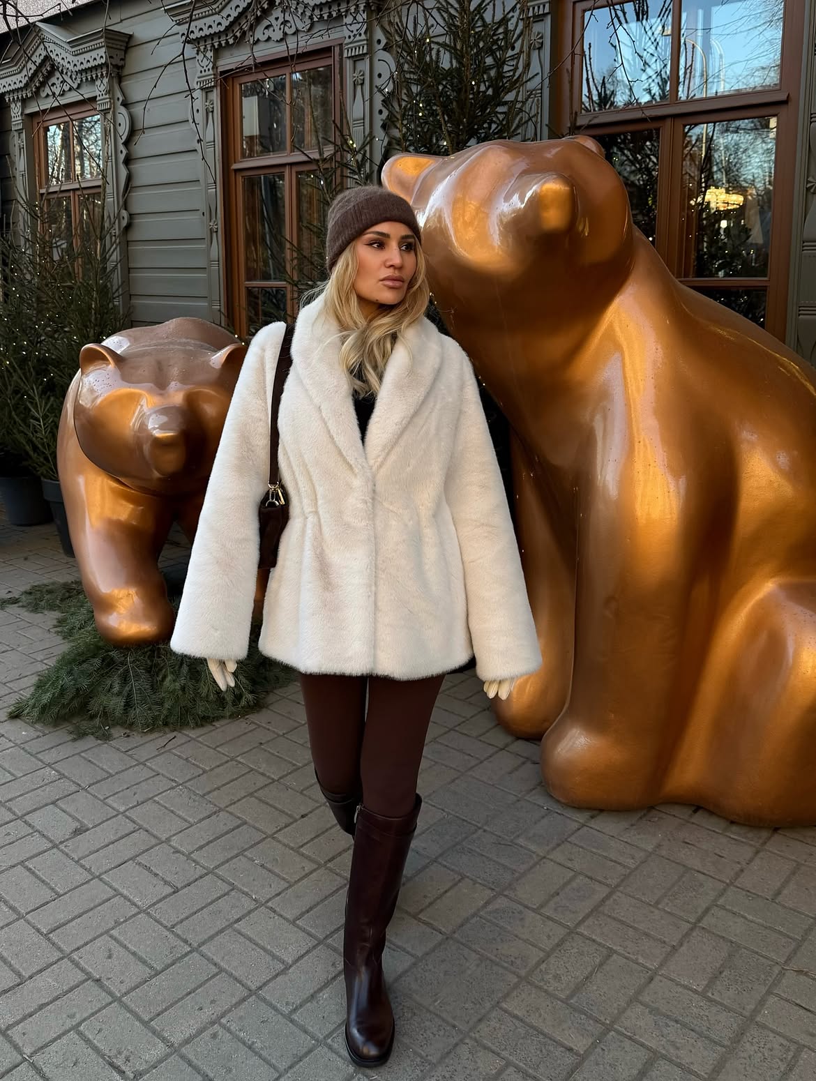 White Faux Fur Coat And Brown Riding Boots